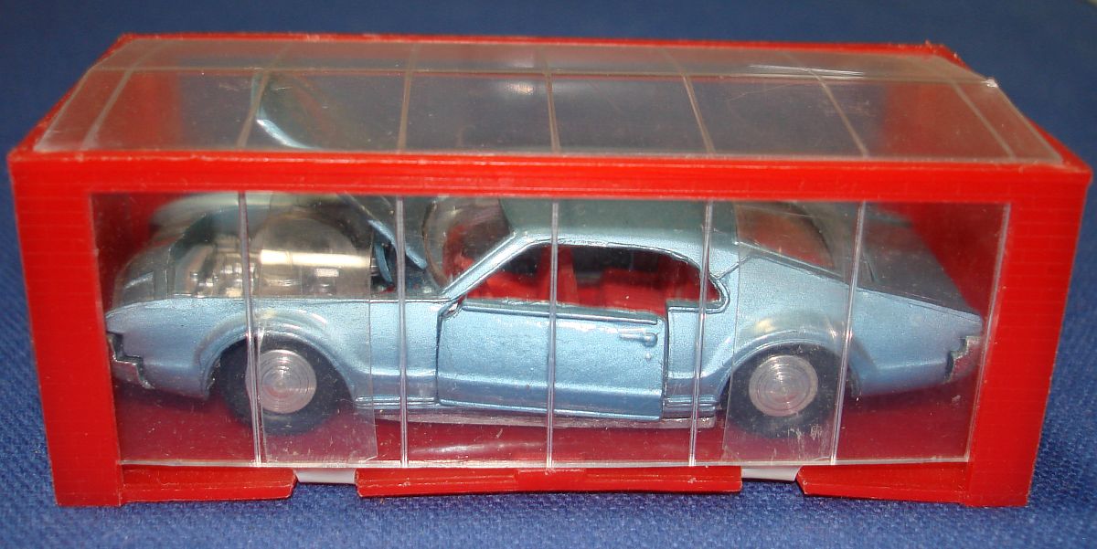 Meccano Mini Dinky Blue Oldsmobile Toronado Muscle Car MIB Parked Inside Red Garage